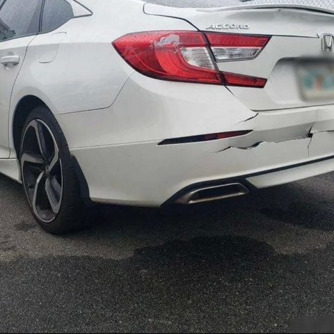 Before: torn rear bumper on a white Honda Accord, Kearny NJ