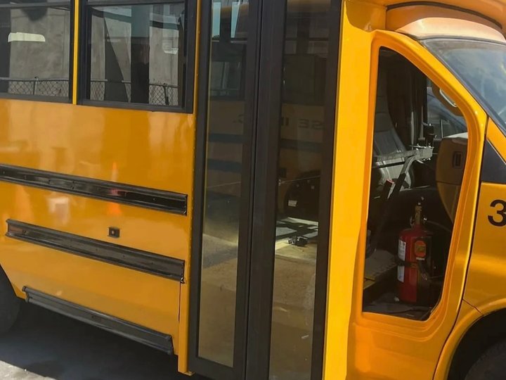 After: the same yellow Collins school bus body repaired and repainted in Kearny, NJ