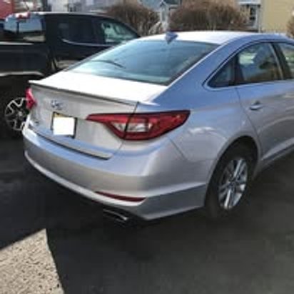 After: the same silver Hyundai Sonata with the rear end repaired and repainted