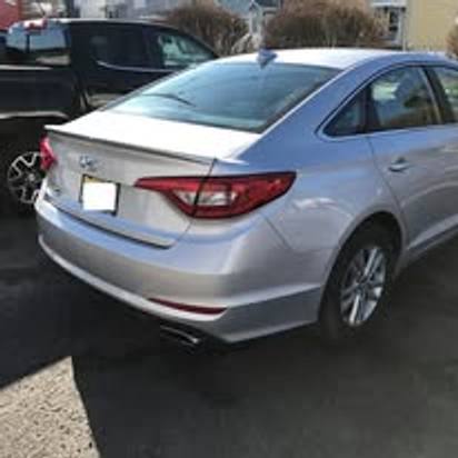 After: the same silver Hyundai Sonata with the rear end repaired and repainted